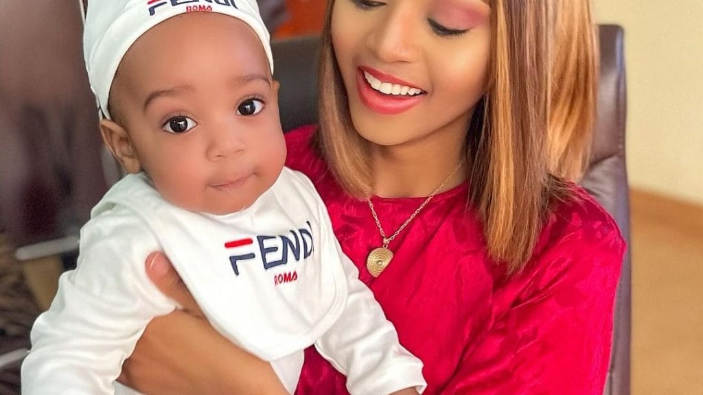 Regina Daniels and her baby.