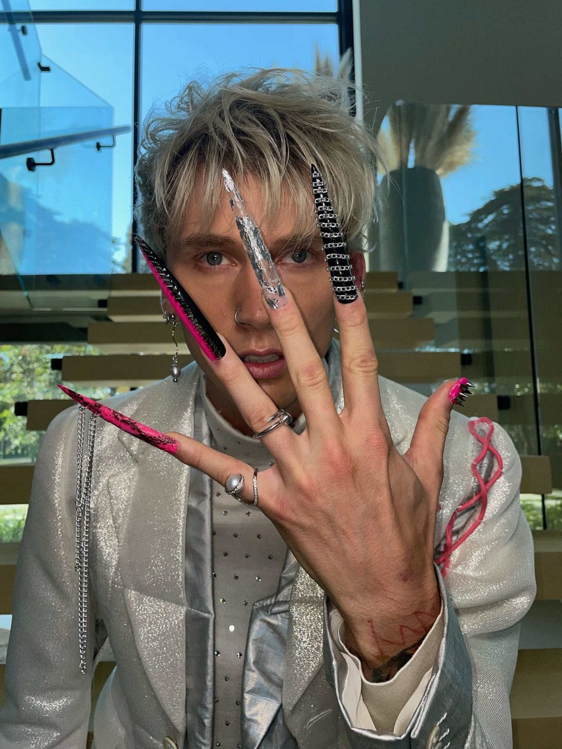 Machine Gun Kelly Rocks an Over 3 Inches Long Nails at iHeartRadio