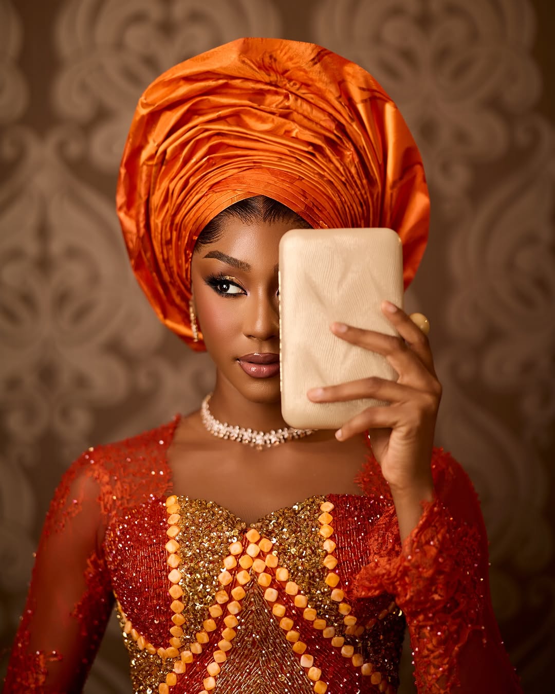 Looking for a Bright and Classy Trad Look? This Elegant Orange Bridal Look Brings the Perfect Mix of Beauty and Culture